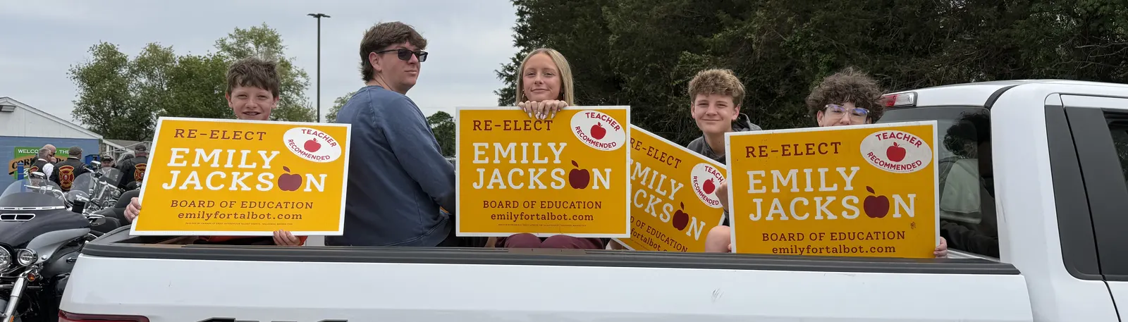 Emily's family with campaign signs